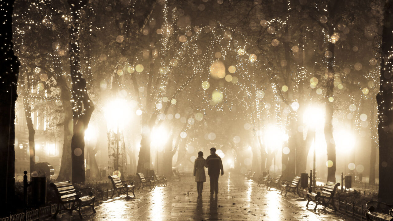 People walking together at night.