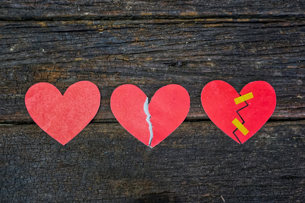 Red,Hearts,Shaped,On,The,Old,Wooden,Floor.the,Heart,Represents