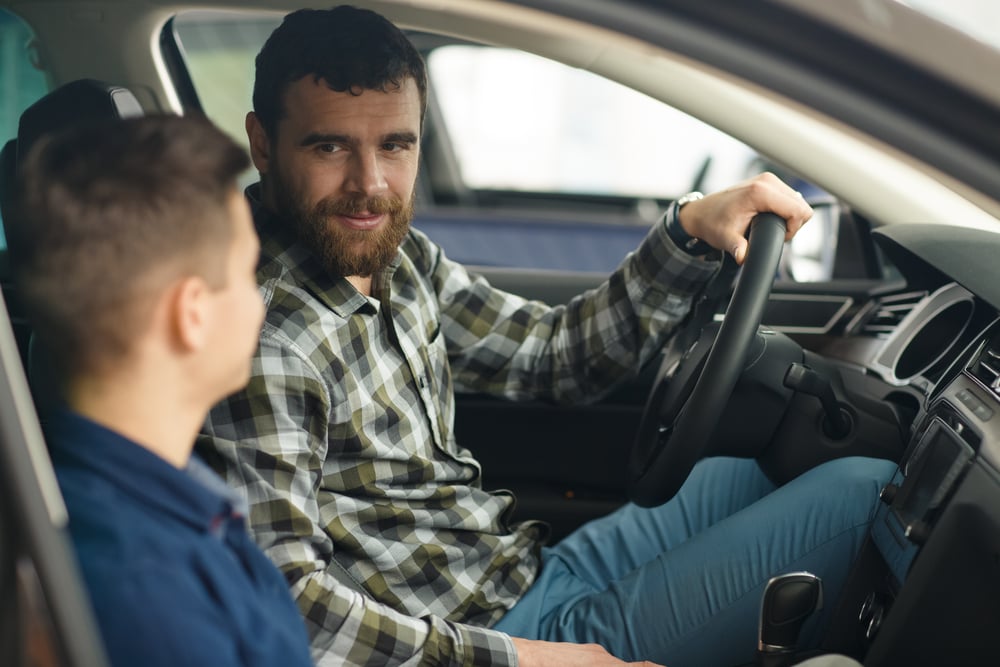 Shot,Of,A,Young,Boy,Talking,To,His,Cheerful,Father