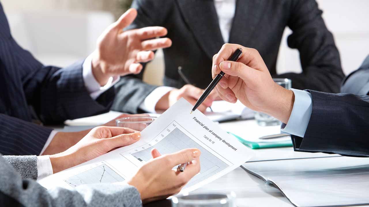 person stuck in meeting having to review documents.